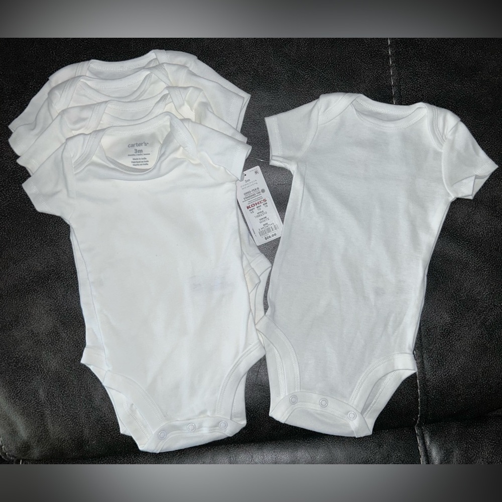 NWT Carter’s white onesie pack